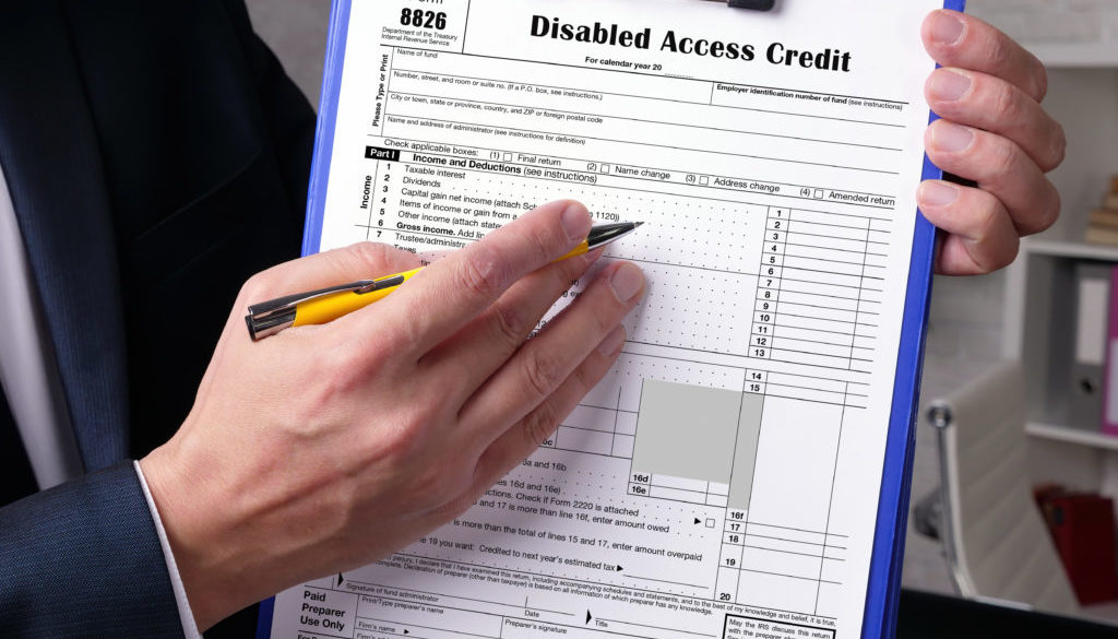 Business concept about Form 8826 Disabled Access Credit with ins