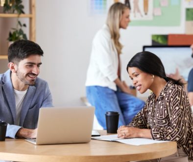 Collaboration, teamwork and strategy meeting for business colleagues sitting at a desk and working