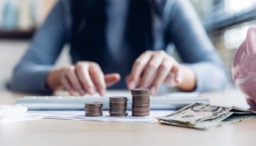 woman working from home concept saving money for finance accounting. Saving money wealth concept,