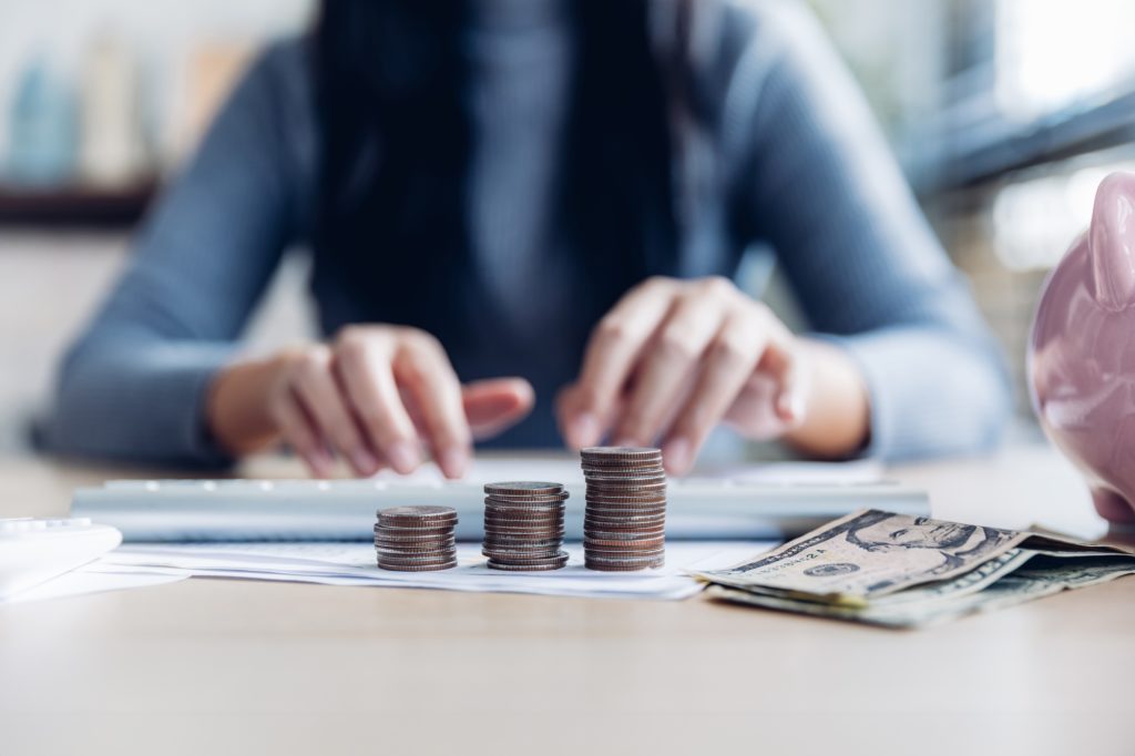 woman working from home concept saving money for finance accounting. Saving money wealth concept,